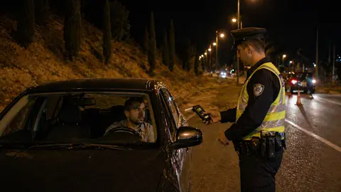 Police checkpoint on a Cypriot road at night